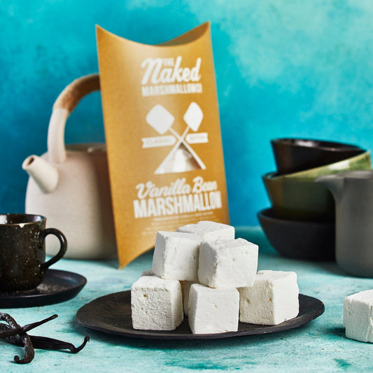 Plain vanilla bean gourmet marshmallows from THE MARSHMALLOW FACTORY, showing soft, fluffy marshmallows on a white background.