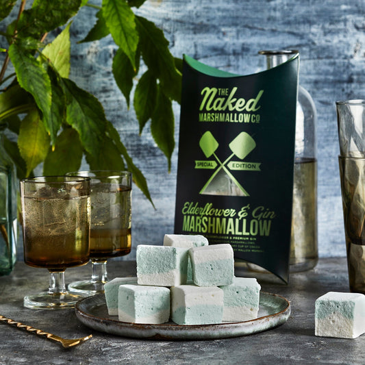 Elderflower and gin gourmet marshmallows from THE MARSHMALLOW FACTORY, close-up showing soft, fluffy marshmallows with elderflower and gin flavor.