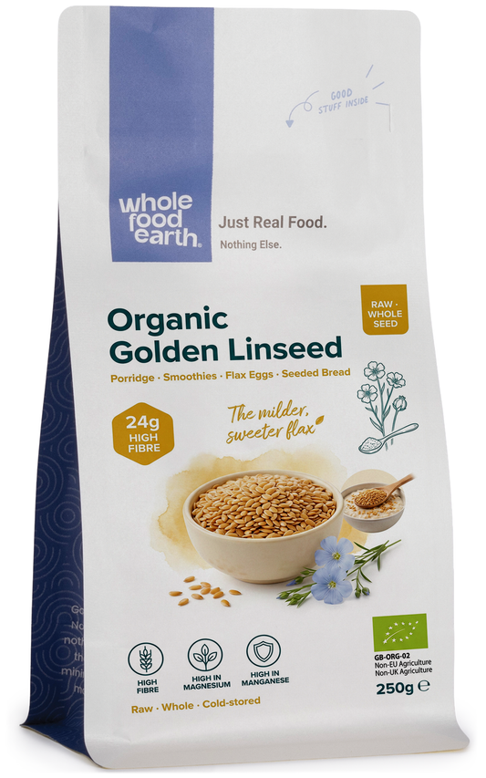Organic golden flaxseed beans from Whole Food Earth, close-up of shiny, golden seeds in a transparent container.