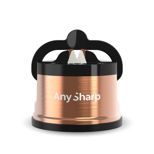 AnySharp Pro knife sharpener in copper finish, classic knife sharpener with ergonomic handle and sharpening slots for precise edge restoration.
