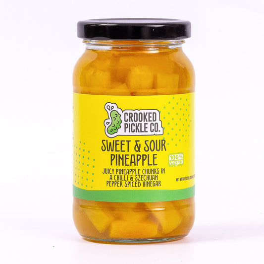 Pineapple pickles in a jar with chilli and szechuan pepper. Cheese pickle and Asian food condiment.
Sexy pickled pineapple pickles.