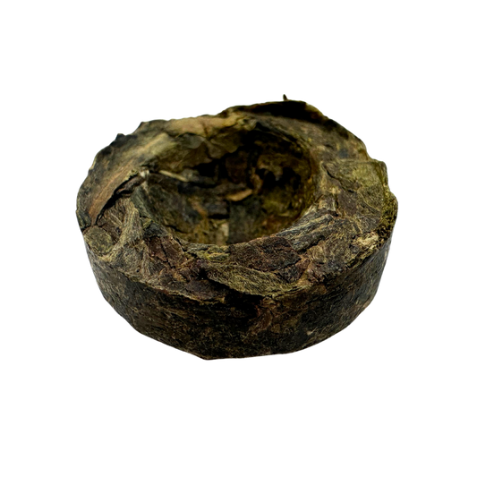 Mini Pu-erh Toucha black tea from Porter Hill Tea Company, showing small compressed tea leaves in a traditional mini cake form.