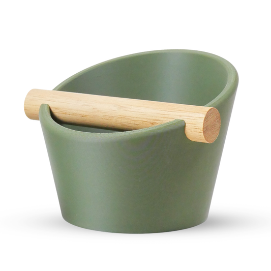 KNOCDIC® oval coffee knock box with sturdy metal body and real oak wood bar for espresso puck disposal.