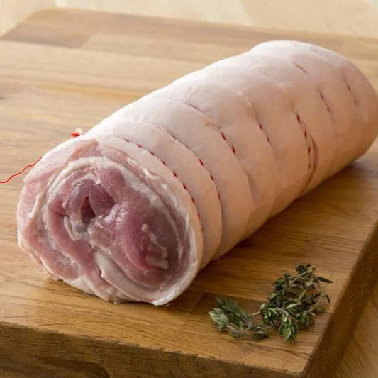 Boneless pork belly joint from Primrose Herd, showcasing fresh pork belly with a smooth, meaty surface ready for cooking.