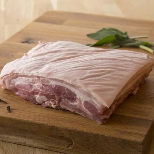 Primrose Herd outdoor-reared pork belly on the bone, fresh and meaty, weighing 1-5kg, ideal for roasting or slow cooking.