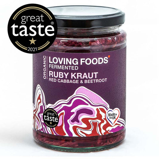 Organic Ruby Kraut by Loving Foods, vibrant fermented sauerkraut with a rich red color in a glass jar.