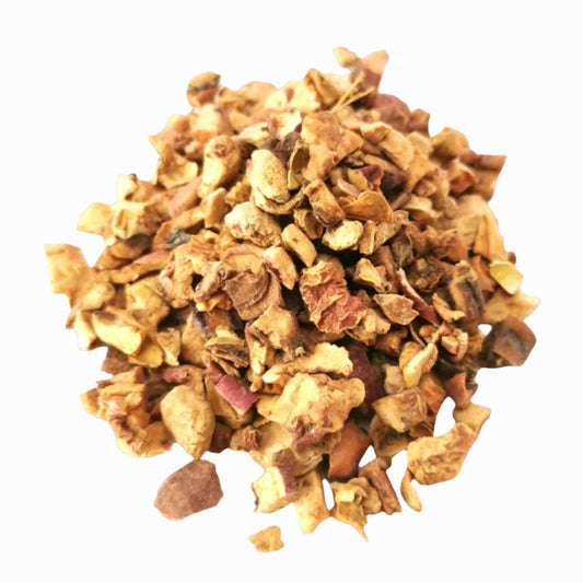 Organic Turkish Apple Tea from Porter Hill Tea Company, showing fresh apple slices and herbal tea ingredients in a clear teacup.