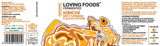 Organic Kimchi by Loving Foods featuring turmeric and black pepper in a 475g jar, showing vibrant fermented vegetables with spices.
