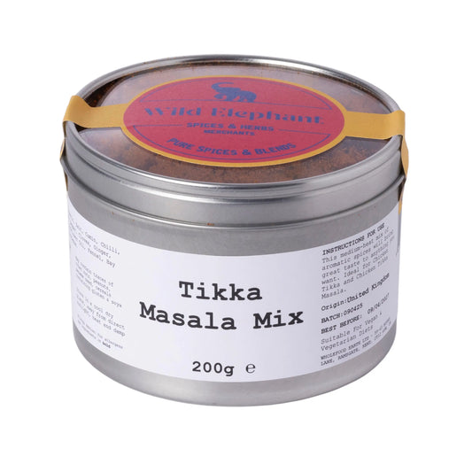 Wild Elephant Tikka Masala Mix from Whole Food Earth, flavorful seasoning blend for Indian-style dishes in a spice packet.