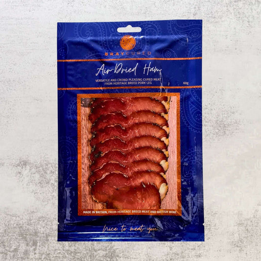 Bray Cured air-dried ham pack showing sliced and whole charcuterie-style ham with rustic packaging.