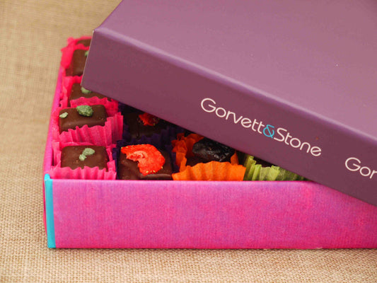 Gorvett & Stone dark chocolate selection box with assorted gourmet chocolates in a gift box.
