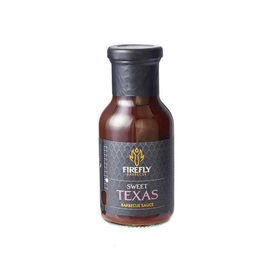 Bottle of FireFly Barbecue Sweet Texas BBQ Sauce with a dark, rich sauce and label visible on the front.