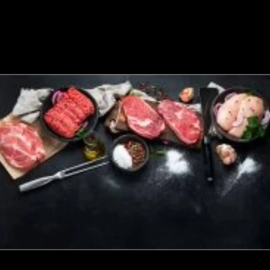 Primrose Herd Cornish Essentials Meat Box with assorted fresh meats in a gift box, ideal for meat lovers.