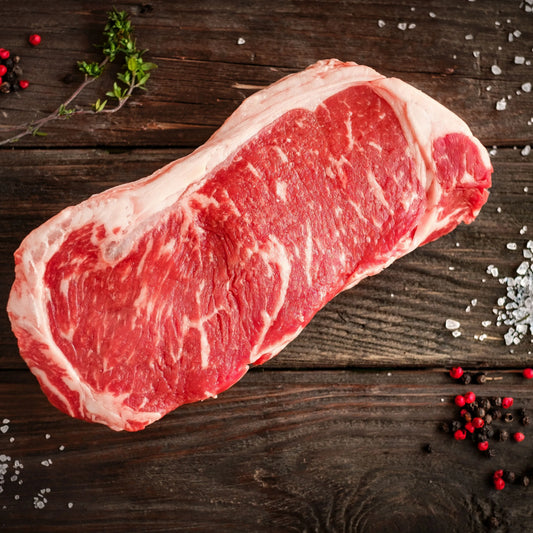 Prime Cornish dry-aged grass-fed beef sirloin steaks from Primrose Herd, showing fresh, thick-cut beef steaks ready for grilling.