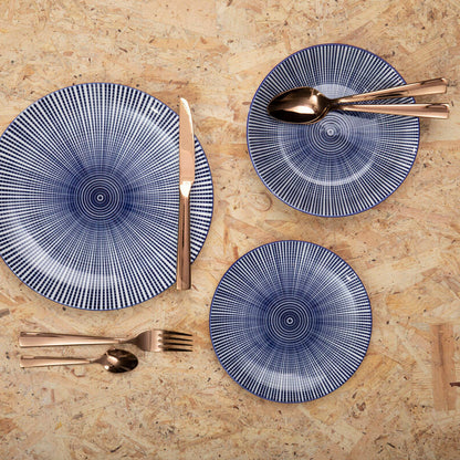 Orsina Lustra 16-piece rose gold cutlery set with forks, knives, spoons, and teaspoons arranged on a table.