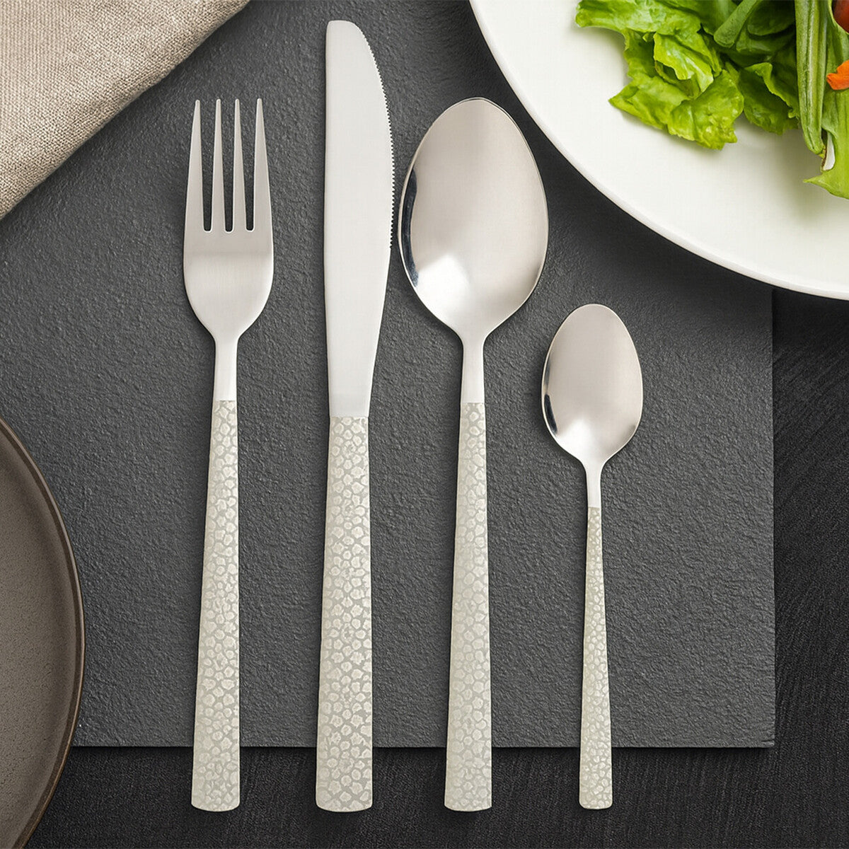Orsina Casablanca 16-piece stainless steel cutlery set including knives, forks, spoons, and teaspoons arranged on a table.