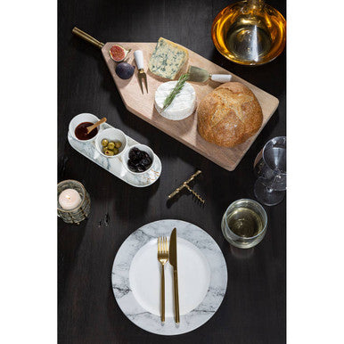 Orsina 16-piece gold finish cutlery set with modern retro design, includes forks, knives, and spoons arranged on a wooden table.