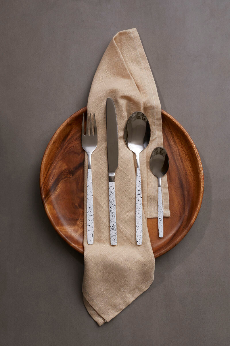 Orsina 16-piece granite pattern cutlery set including knives, forks, and spoons arranged on a table.