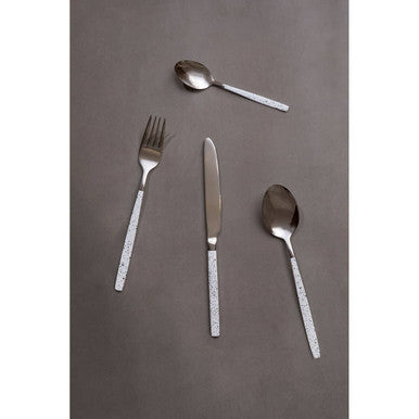 Set of 16 granite pattern Orsina cutlery pieces including forks, knives, and spoons arranged on a table.