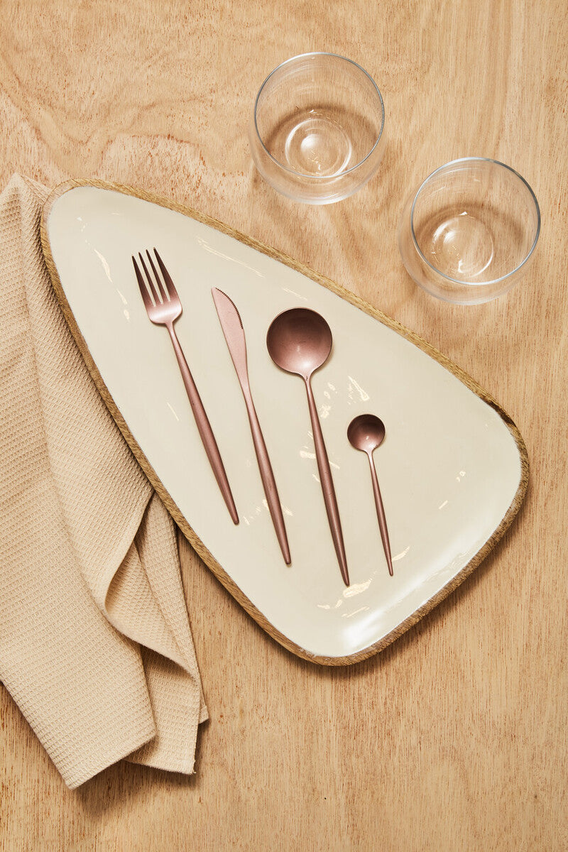 16-piece matte pink finish cutlery set by Orsina, including forks, knives, spoons, and serving utensils arranged on a white background.