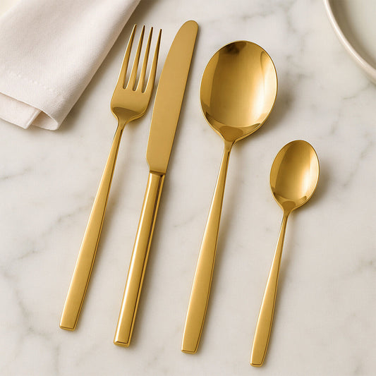 Orsina 16-piece gold finish stainless steel cutlery set, includes knives, forks, spoons, with elegant gold detailing.