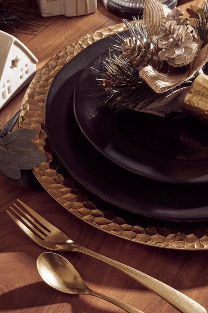 16-piece antique gold finish Orsina cutlery set including forks, knives, spoons, and teaspoons displayed on a table.