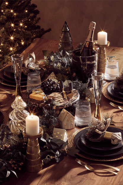 Orsina 16-piece antique gold finish cutlery set, including forks, knives, and spoons arranged on a table.