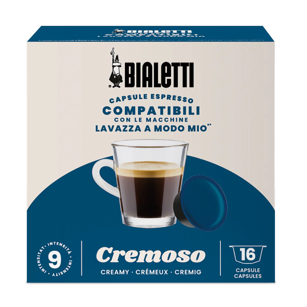 Bialetti Lavazza A Modo Mio compatible coffee capsules by Brew Italia, featuring a row of beige and brown capsules on a white background.