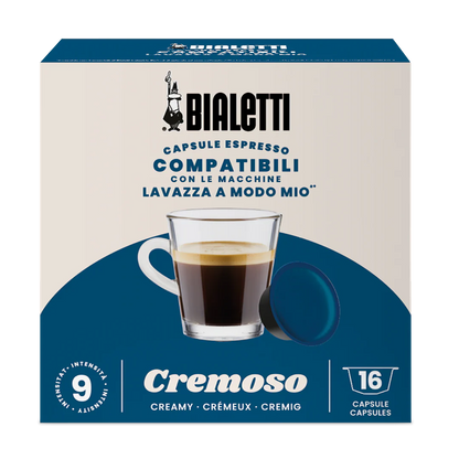 Bialetti Lavazza A Modo Mio compatible coffee capsules by Brew Italia, featuring a row of beige and brown capsules on a white background.