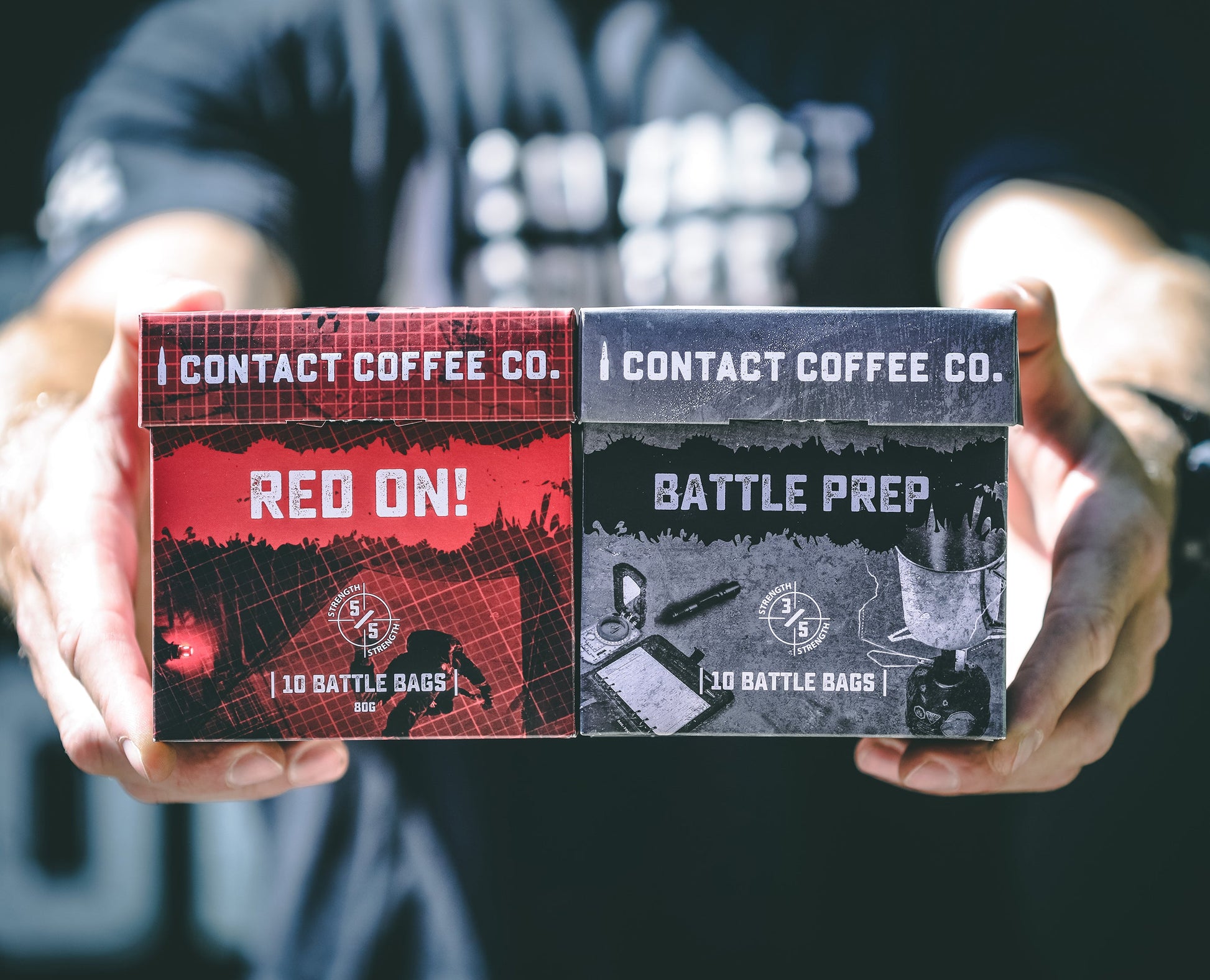 Single serve coffee bags bundle from Contact Coffee Company Ltd. displayed in a neat arrangement on a wooden surface.