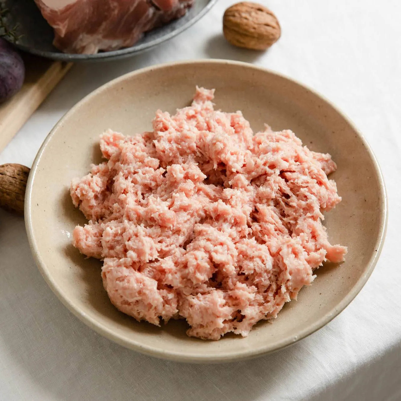 Primrose Herd sage and onion sausage meat 500g in a clear plastic package, ready for cooking or stuffing.