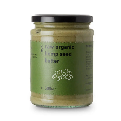 Creamy raw organic hemp seed butter from Whole Food Earth, perfect as a dip or spread, shown in a jar with a spoon.