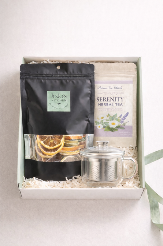 JoJo’s Kitchen The Tea and Talk Kit with assorted tea bags, teapot, and cups for a cozy tea time experience.