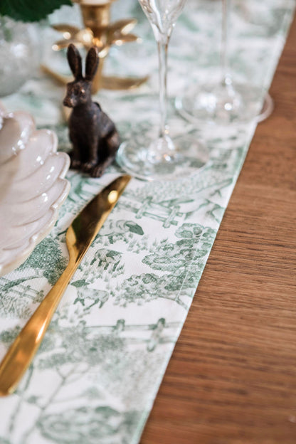 Lake District Toile table runner by Avalon Home UK featuring traditional toile design in natural colors on fabric.
