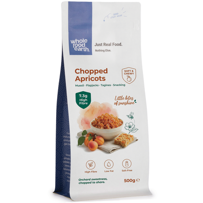 Dried chopped apricots from Whole Food Earth in a clear container, showcasing vibrant orange pieces of dried apricots.