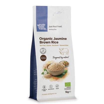 Organic Jasmine Brown Rice from Whole Food Earth, uncooked rice grains in a bowl showing its fluffy, aromatic texture and light brown color.