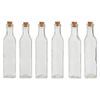 Set of 6 Orsina Tromso glass jars arranged together, showing clear bottle design and matching lids