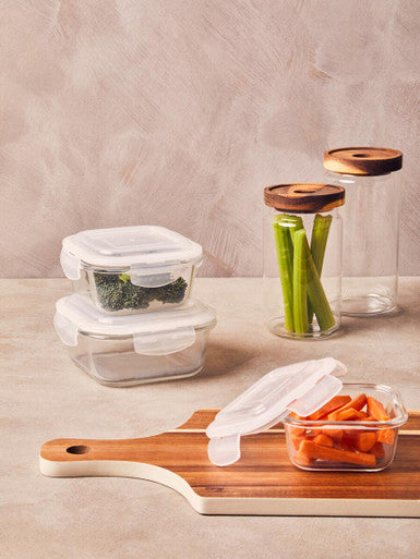 Orsina 800ml glass storage jar with acacia wood lid, shown on a kitchen counter
