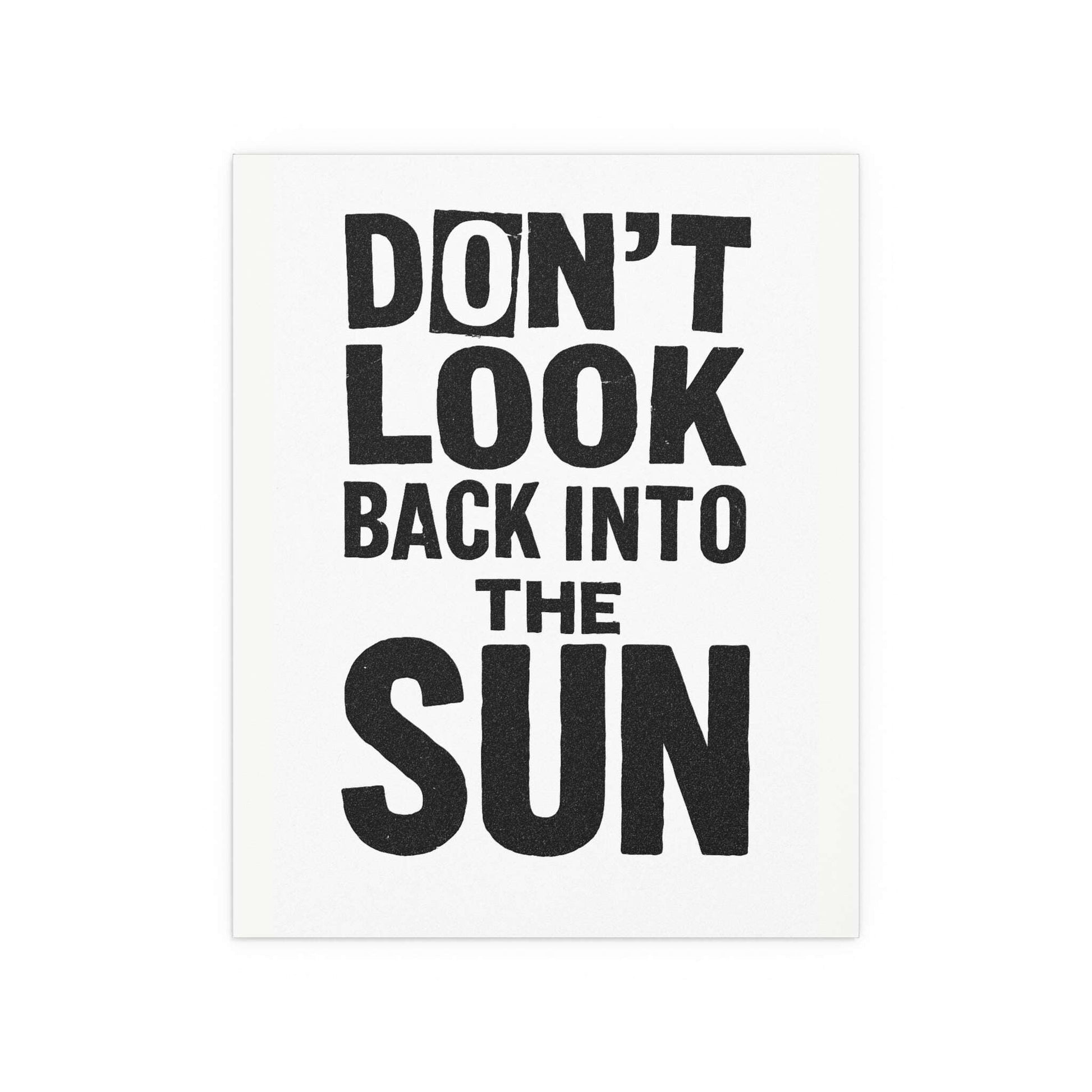 Poster of The Libertines' "Don't Look Back Into The Sun" in black and white, featuring band artwork on a white background.