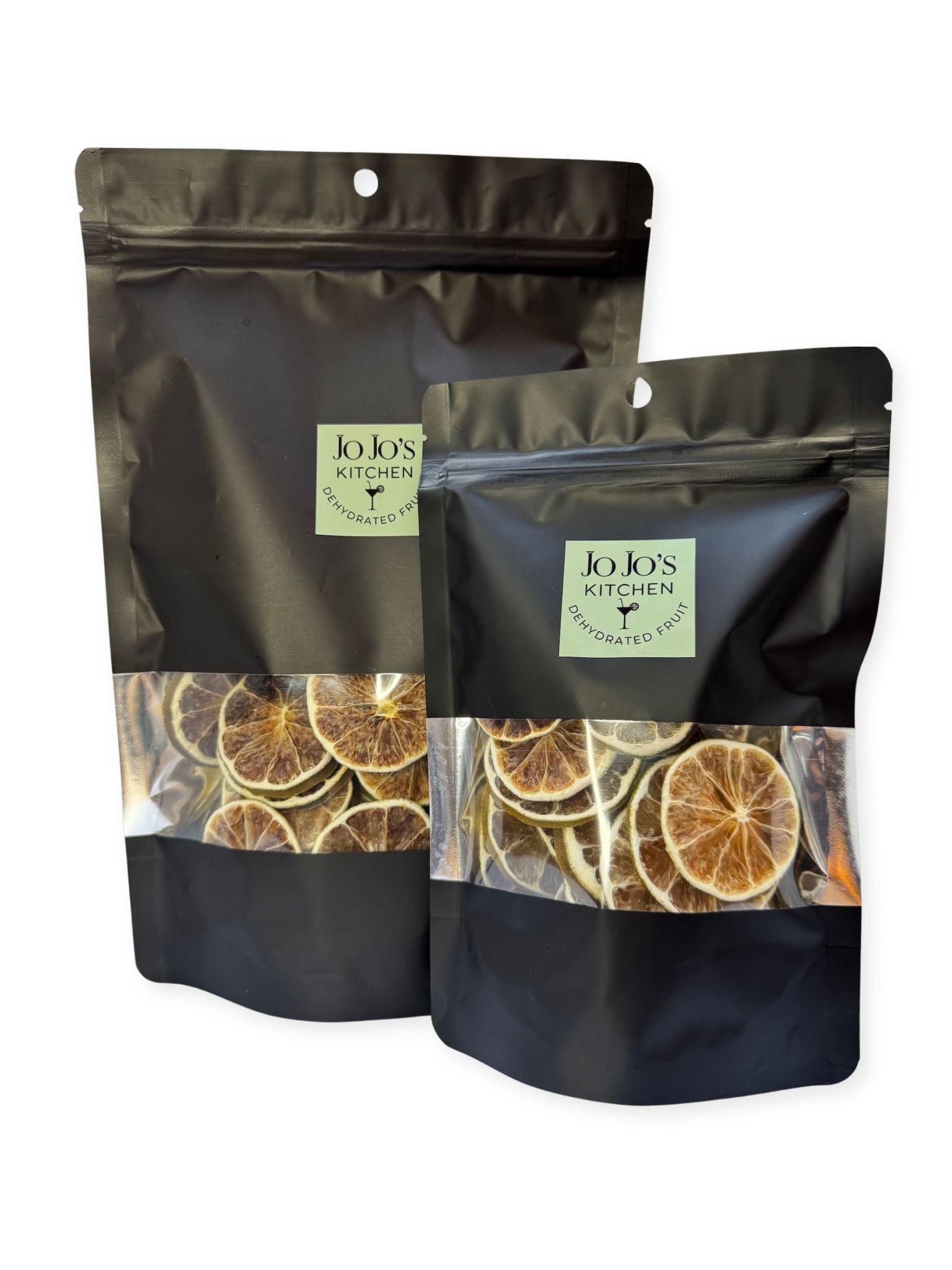 Dehydrated lime slices from JoJo’s Kitchen, round citrus slices with textured yellow-green surface and slightly dry appearance.
