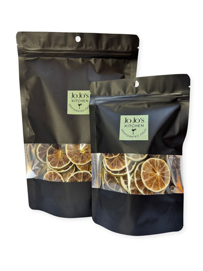 Dehydrated lime slices from JoJo’s Kitchen, round citrus slices with textured yellow-green surface and slightly dry appearance.