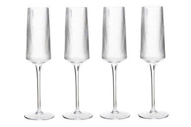 Set of four ribbed champagne glasses by Orsina, featuring textured glass design and elegant transparent finish