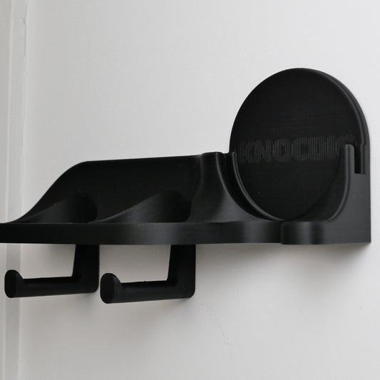 KNOCDIC® wall mount portafilter holder for 51/54/58mm portafilters, tamper, and dosing funnel, mounted on a kitchen wall.