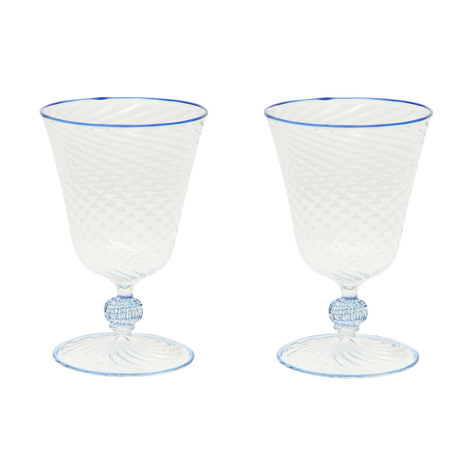 Two blue Dido Venetian wine glasses by domenicamarland with elegant curved stems and clear glass bowls.