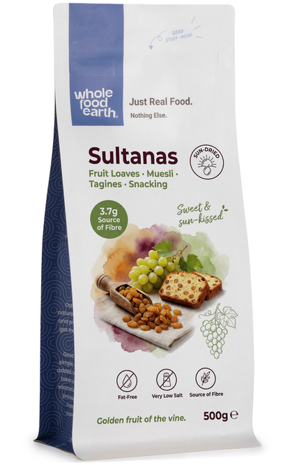 Dried Turkish sultanas from Whole Food Earth, plump and golden, showcasing their glossy, wrinkled surface in a clear container.