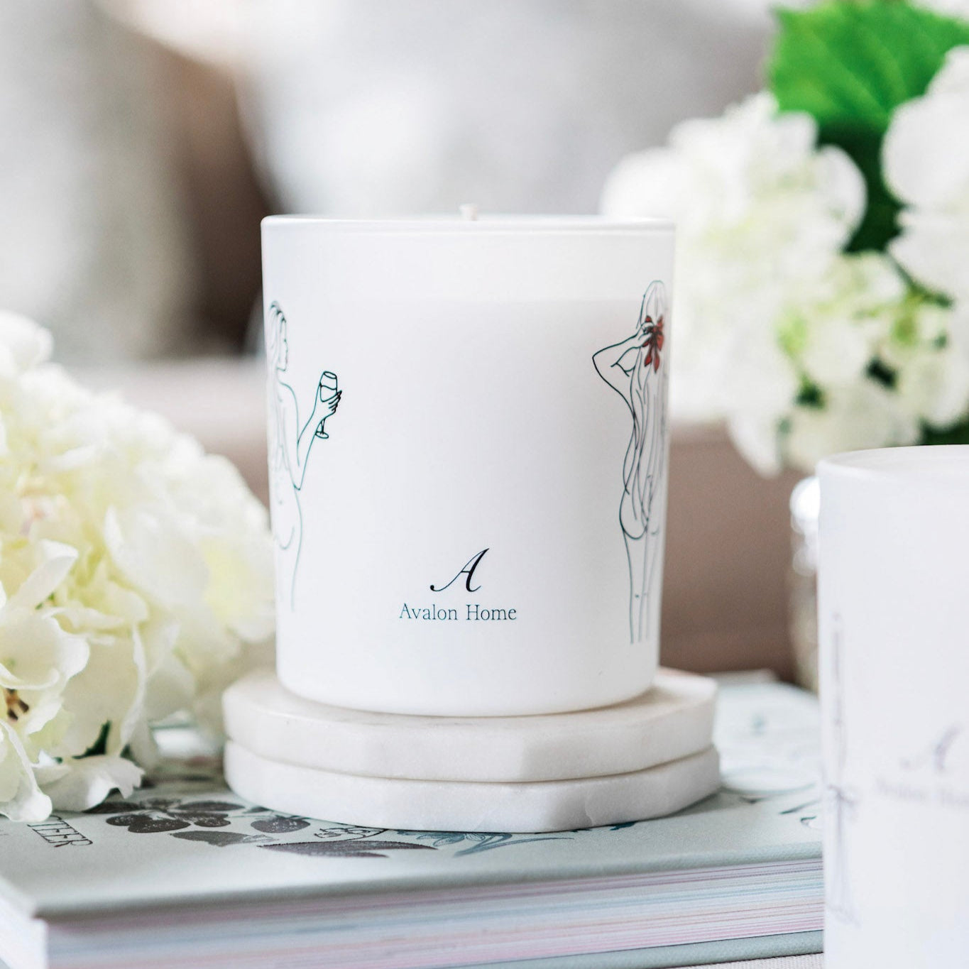 Natural wax glass candle by Avalon Home UK with a clear glass container, perfect for creating a cozy ambiance.