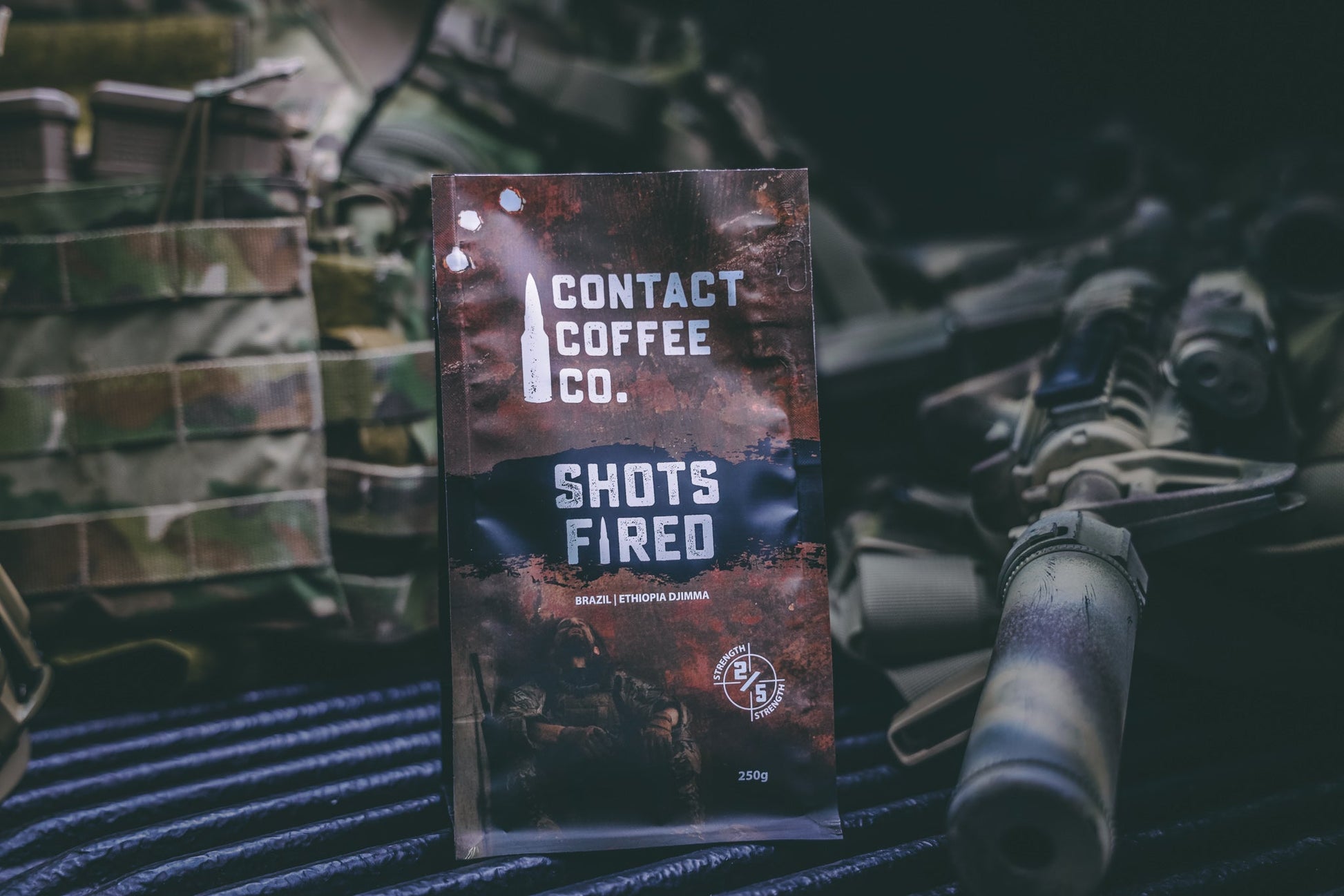 Cup of Shots Fired Coffee from Contact Coffee Company Ltd., showcasing rich dark roast coffee in a ceramic mug.