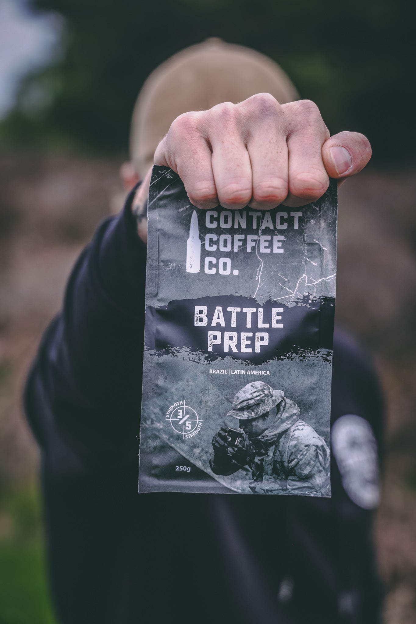 Close-up of Contact Coffee Company Ltd. Battle Prep Coffee in a coffee cup, showcasing rich brewed coffee with a smooth surface.
