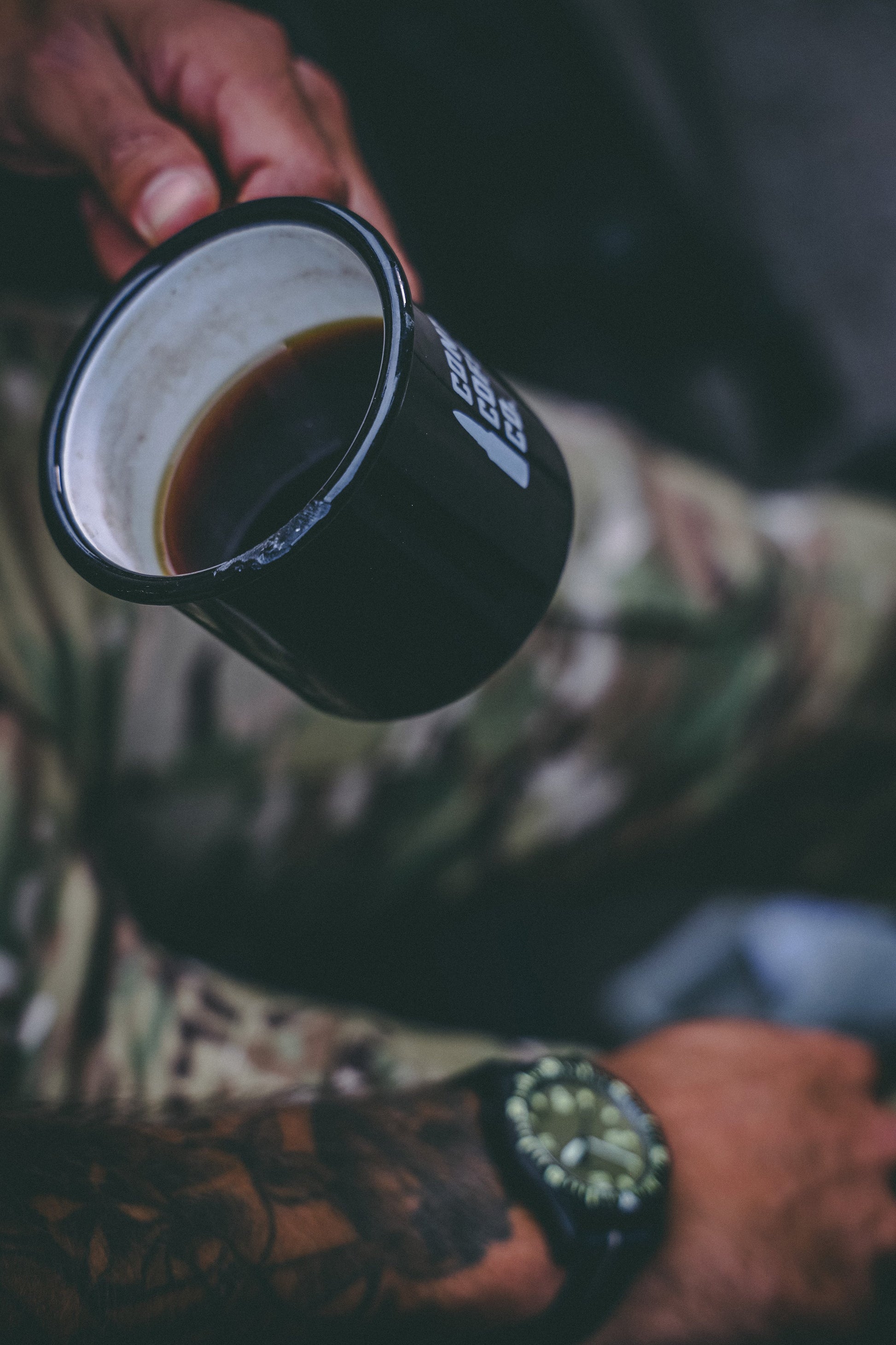 Contact Coffee Company Ltd. enamel mug with gear design, sturdy metal cup with colorful enamel coating and gear pattern.