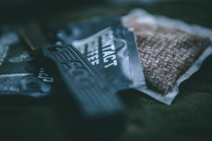 Single serve coffee bag from Contact Coffee Company Ltd., Battle Prep flavor, ready for brewing and enjoying a fresh coffee.